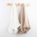 Ruffle trim baby blankets in cream and tan from a baby blankets factory in China.