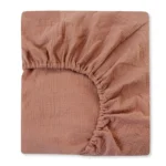 Solid terracotta muslin crib sheet from a professional crib sheets manufacturer in China.