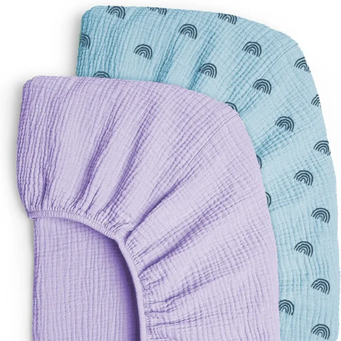 Purple and blue patterned muslin crib sheets from an OEM crib sheets manufacturer in China.