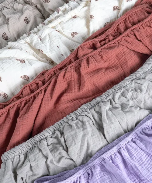 Various colors and patterns of muslin crib sheets from a leading crib sheets manufacturer in China.