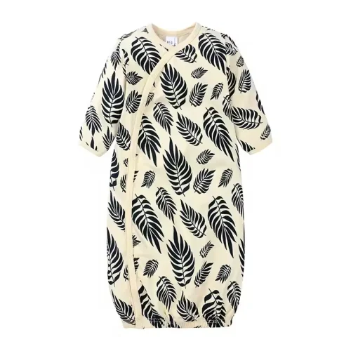 Custom baby kimono sleep gown, featuring a modern black and white palm leaf print, long sleeves, and convenient side-snap closures. High-quality infant sleepwear from a professional OEM/ODM clothing manufacturer.