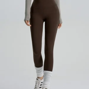 Custom Leggings manufacturer sample of deep brown high-waisted yoga leggings.