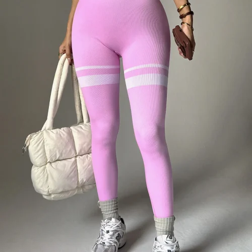 Pink high-waisted color-block leggings with white stripe details, provided by a professional OEM/ODM activewear manufacturer.